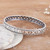 Sterling silver bangle bracelet, 'Spring Beauty' - Polished Flower-Themed Sterling Silver Bangle Bracelet