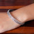 Sterling silver bangle bracelet, 'Spring Beauty' - Polished Flower-Themed Sterling Silver Bangle Bracelet