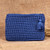 Crocheted cosmetic bag, 'Glam Essentials' - Crocheted Cosmetic Bag in Blue with Tassel from Armenia