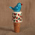 Ceramic bottle stopper, 'Spring Elixir' - Spring-Themed Ceramic Bottle Stopper with Blue Bird Detail