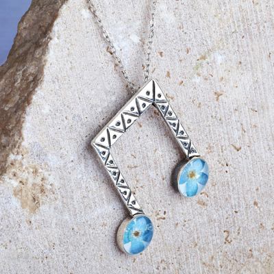 Natural flower and sterling silver pendant necklace, 'Rhythm & Memories' - Beam Note-Shaped Blue Natural Flower Pendant Necklace
