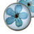 Natural flower button earrings, 'Serene Blossom' - Round Resin Coated Forget-Me-Not Flower Button Earrings