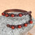 Copper and carnelian wrap bracelet, 'Infinite Flames' - Antique Armenian Copper Wrap Bracelet with Carnelian Beads
