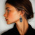 Sterling silver dangle earrings, 'Spiral Ovals' - Textured Darkened Spiral Themed Oval Silver Dangle Earrings