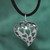Sterling silver pendant necklace, 'Romantic Silhouettes' - Heart-Shaped High-Polished Sterling Silver Pendant Necklace