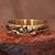 Brass band ring, 'Blossoming Golden' - Oxidized and Polished Brass Band Ring with Floral Motifs