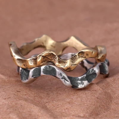 Sterling silver and brass stacking rings, 'Waves of Puissance' (set of 2) - Antiqued 2-Piece Sterling Silver and Brass Stacking Ring Set