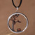 Sterling silver and copper long pendant necklace, 'Tree of Life Circle' - Tree of Life Themed Silver and Copper Long Pendant Necklace