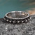 Sterling silver band ring, 'Myriad Suns' - Sun-Themed Oxidized and Polished Sterling Silver Band Ring