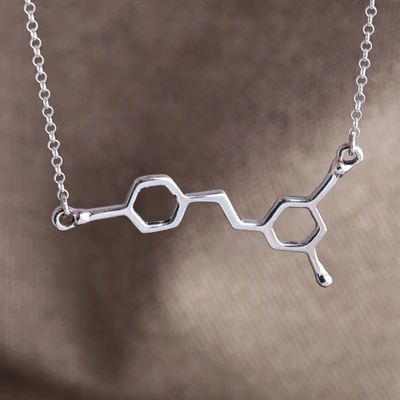 Sterling silver pendant necklace, 'Distinguished Molecule' - Geometric Wine Molecule Sterling Silver Pendant Necklace