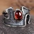 Garnet cocktail ring, 'Passion's Strength' - Abstract Sterling Silver Garnet Cocktail Ring from Armenia