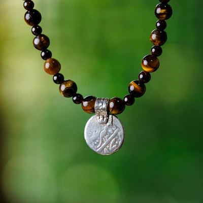 Tiger's eye and garnet beaded choker pendant necklace, 'Precious History' - Cultural Tiger's Eye and Garnet Choker Pendant Necklace