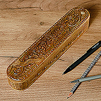Wood puzzle box, 'Oblong Paradise' - Hand-Carved Oblong Floral Walnut Wood Puzzle Box