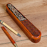 Wood puzzle box, 'Noble Spring' - Floral Hand-Carved Oblong Walnut Wood Puzzle Box in Brown