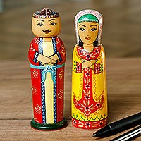 Wood figurines, 'Majestic Marriage' (set of 2) - Set of 2 Yellow and Red Wood Bride and Groom Figurines