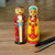 Wood figurines, 'Majestic Marriage' (set of 2) - Set of 2 Yellow and Red Wood Bride and Groom Figurines