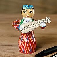 Wood figurine, 'Tanbur Red Rhythms' - Painted Traditional Red Wood Figurine of Girl and Tanbur