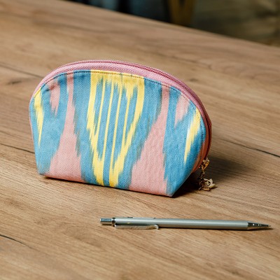 Ikat cotton cosmetic bag, 'Colorful Patterns' - Colorful Ikat Cotton Cosmetic Bag Crafted in Uzbekistan