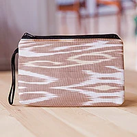Cotton cosmetic bag, 'Ikat Tenderness' - Beige and White Ikat Patterned Cotton Zippered Cosmetic Bag
