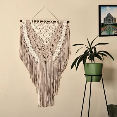 Cotton macrame wall hanging, 'Woven Heritage' - Handwoven Beige and Ivory Cotton Macrame Wall Hanging
