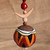 Ceramic wall decor, 'Fire Daghdghan' - Traditional Painted Warm-Toned Ceramic Daghdghan Wall Accent