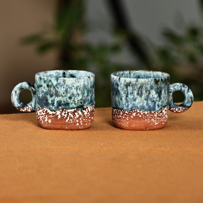 Ceramic cup and saucer, 'Blue Coffee Breeze' (set of 2) - Set of 2 Handmade Blue and Brown Ceramic Cups and Saucers
