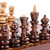 Wood mini chess set, 'Checkmate Conquest' - Wood Mini Chess Game Set Hand Carved in Armenia