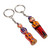 Wood keychains, 'Festive Taraz' (set of 2) - Glazed 2-Piece Yellow and Red Taraz Couple Wood Keychain Set