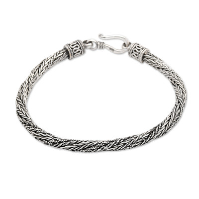 Men's sterling silver braided bracelet, 'Wyvern Mystique' - Men's Hand Made Textured Silver Braided Bracelet