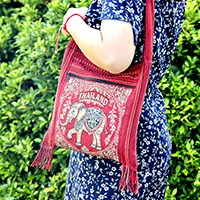 Cotton blend sling bag, 'Joyful Journey' - Elephant-Themed Red Fringed Sling Bag with Handwoven Accents