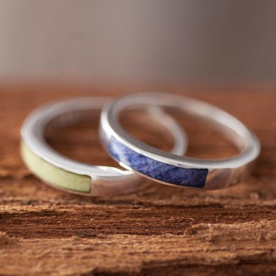 Sodalite and serpentine band rings, 'Dual Enchantment' (pair) - Sodalite and Serpentine Band Rings (Pair)