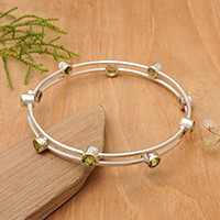 Peridot bangle bracelet, 'Orchid Twist in Green' - Hand Made Sterling Silver Peridot Bangle Bracelet Indonesia