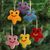 Wool felt ornaments, 'Cheery Stars' (set of 6) - Assorted Wool Felt Star Ornaments from India (Set of 6) (image 2) thumbail