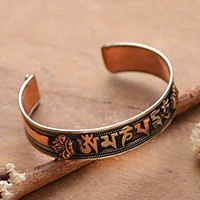 Copper cuff bracelet, 'Holy Words' - Buddhist Mantra-Themed Engraved Copper Cuff Bracelet