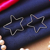 Sterling silver hoop earrings, 'Written in the Stars' - Star-Shaped Sterling Silver Hoop Earrings from India