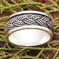 Sterling silver meditation ring, 'Defying Gravity' - Traditional Braid-Patterned Sterling Silver Meditation Ring