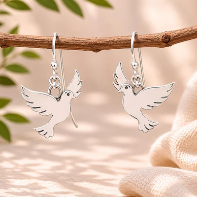 Sterling silver earrings, 'Dove's Flight' - Sterling Silver Doves in Flight Dangle Earrings from Mexico