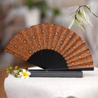 Silk batik fan, 'Aster Orange' - Hand Crafted Orange Batik Silk Fan