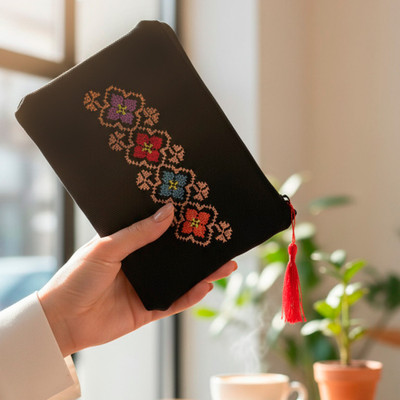 Cotton cosmetic bag, 'Floral Marvel' - Floral Hand-Embroidered Denim Jean Cosmetic Bag with Tassel