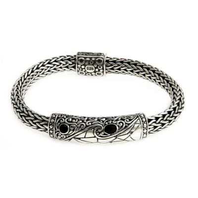 Men's onyx braided bracelet, 'Dragon Eyes' - Sterling Silver and Onyx Accent Men's Bracelet