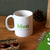 White ceramic Kiva mug, 'Comfort' - White ceramic Kiva logo mug (image 2) thumbail
