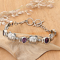 Amethyst link bracelet, 'Turtle Migration' - Balinese Silver Turtle Theme Handcrafted Amethyst Bracelet