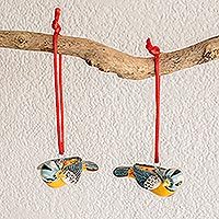 Ceramic ornaments, 'Seven Colors' (pair) - Handcrafted Pair of Ceramic Bird Ornaments