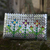 Recycled metalized wrapper clutch handbag, 'Garden Flower' - Recycled metalized wrapper clutch handbag thumbail