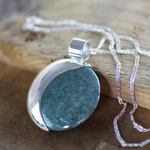 Jade pendant necklace, 'Quetzal Eclipse' - Sun and Moon Sterling Silver Pendant Jade Necklace