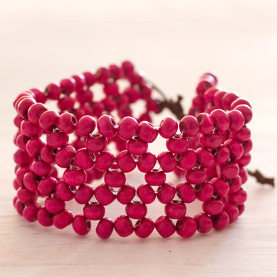 Wood beaded wristband bracelet, 'Soul Star' - Fair Trade Magenta Wood Beaded Wristband Bracelet