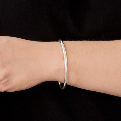 Gold accent sterling silver cuff bracelet, 'Sun and Moon' - Sterling Silver Cuff Bracelet with 21k Gold Accent