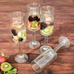 Blown glass flutes, 'Party Quetzal' (set of 4) - Clear Hand-blown Glass Flute Wine Glasses (Set of 4)