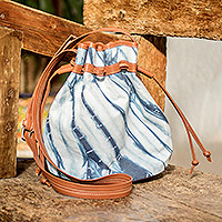 Cotton with leather accent shoulder bag, 'Indigo Clouds' - Fair Trade Womens Draw String Shoulder Bag with Natural Indi