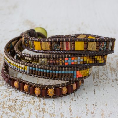 Beaded wristband bracelet, 'Fertile Lands' - Handmade Four Strand Multi colour Bead Bracelet with Leather